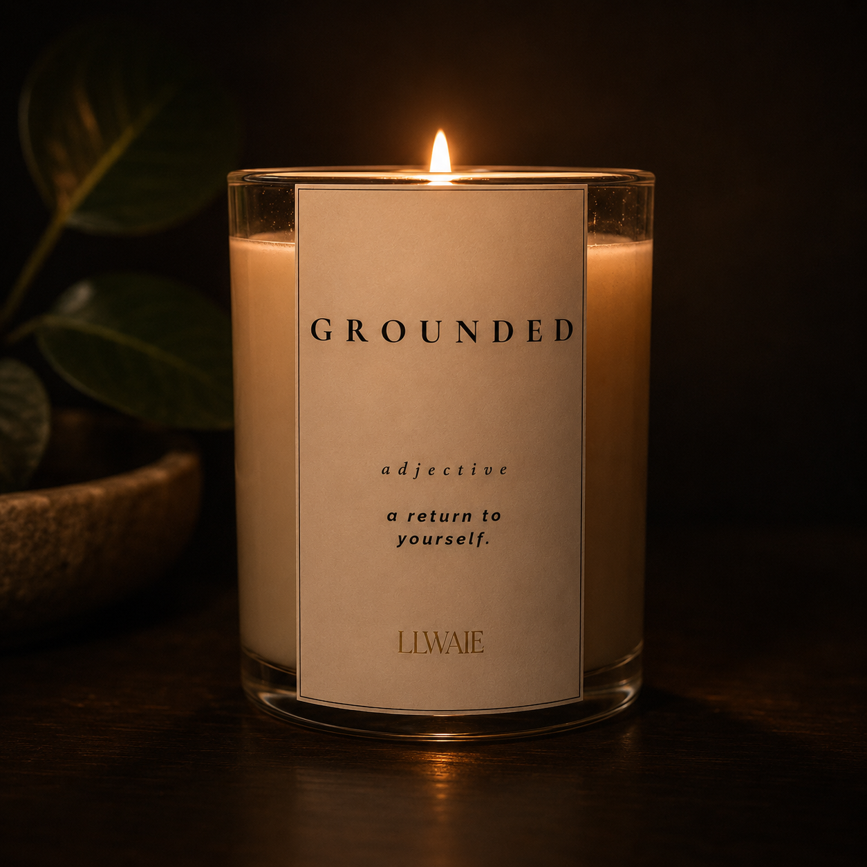 LLWALE Grounded candle lit at night, moody ambiance